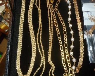 close-up of chains and a few bracelets