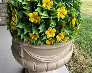 Clay planter with faux flowers