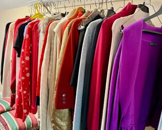 Closets of women's clothing and shoes
