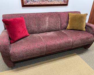 Upholstered couch by AGI.