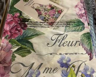 New-in-package apron by Michel Design Works, “Wild Hydrangea” pattern.