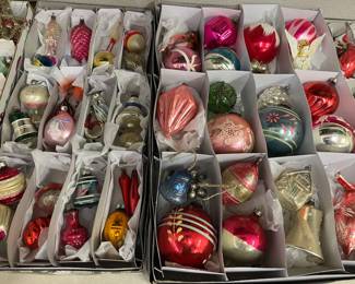 Large selection of vintage Christmas ornaments.