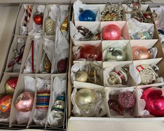 Large selection of vintage Christmas ornaments.