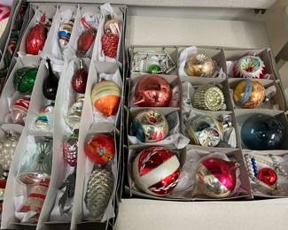 Large selection of vintage Christmas ornaments.