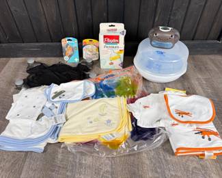 Lot - 57
NOS Gymboree 0-9 Months Baby Gift Sets + Avent Bottle Warmer +