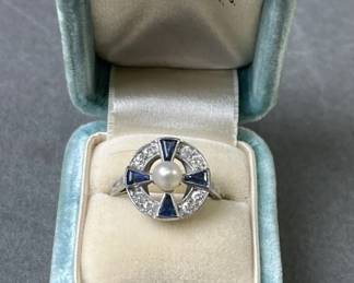 Lot 181 | 1920s Platinum Diamond, Sapphire & Pearl Ring
