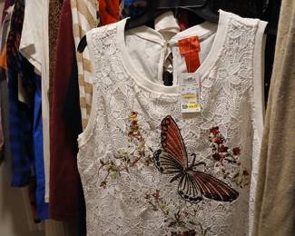 Lots of women's clothes from QVC still with tags.