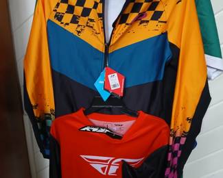 Lots of new mens and women's clothing still with tags.