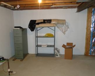 Free carpeting, and free file cabinet, and metal rack