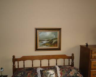 Lighthouse art for the wall, and a headboard for a bed for sleeping