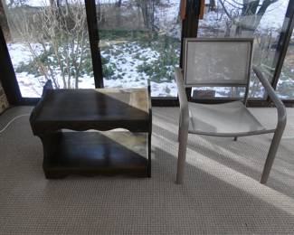 TV stand, or two shelf unit, which would make a great project piece, and a random comfortable outdoor chair