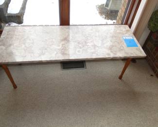 As far as Mid Century Modern goes, it does not get any better than this pristine coffee table