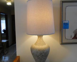 As most Mid Century Modern lamps are, this one is large and overstated