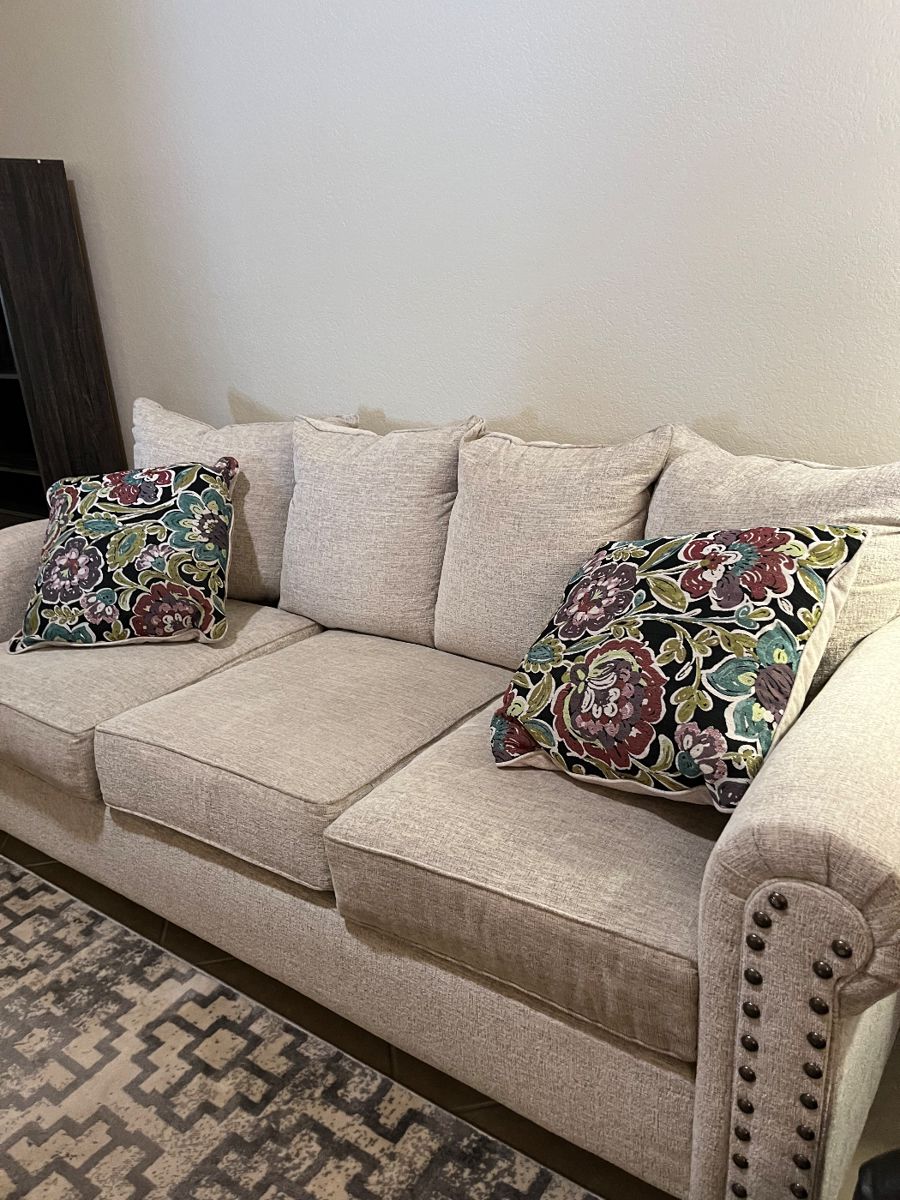 There are two of these sofas.