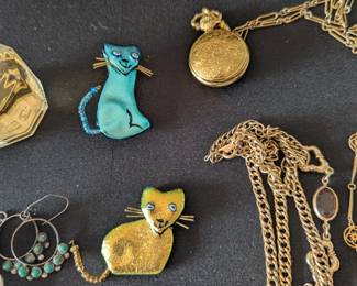 Enamel cat brooches