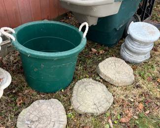 Stepping stones, garden plastic bucket and barrow