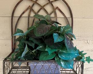 Metal hanging shelf with faux plant