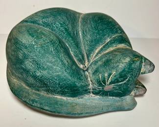 Carved wood sleeping cat