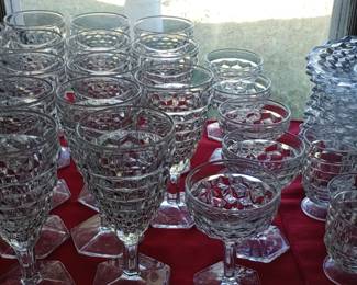 Huge collection of vintage American Fostoria water glasses wine glasses compost juice glasses and serving plates