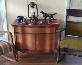 Antique oak law stand with Serpentine front