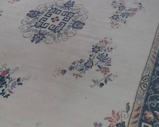 Very large area rug upstairs in the sunny bedroom