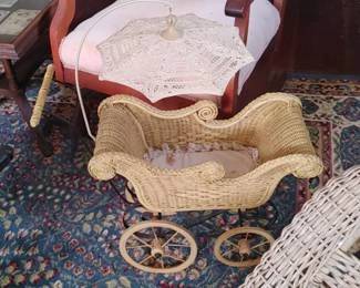 Worker doll pram with wrought iron and umbrella