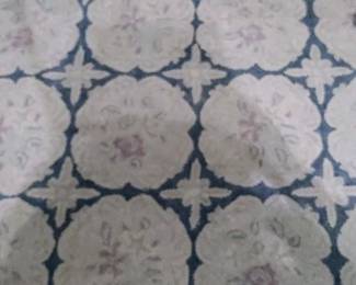 Vintage hooked rug located upstairs
