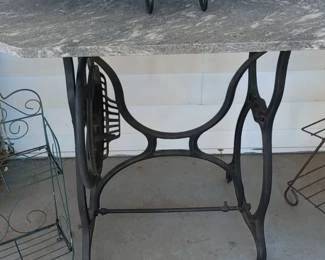 Great marble top table with cast iron Singer sewing machine base