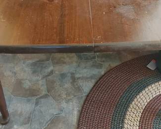 Gorgeous early antique mahogany table with two leaves Paw feet and turned