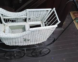 Wicker and wrought iron doll carriage