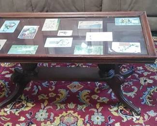 Beautiful glass top coffee table often used to display cards and other paper objects antique Duncan phife double pedestal with claw feet