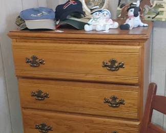 Four drawer wooden chest of drawers