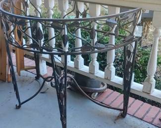 Heavy wrought iron half table needs glass top