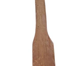 Primitive hand carved paddle for stirring