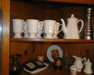 We have an outstanding set of white pottery pieces