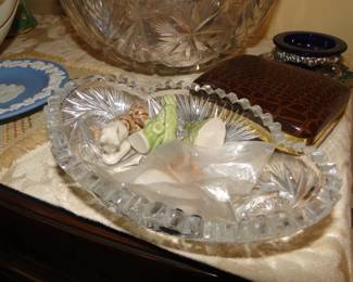 Cut glass pieces with Wade figurines