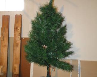 Table top Christmas tree, or you can put in on the floor, or sideboard, we wont tell anyone