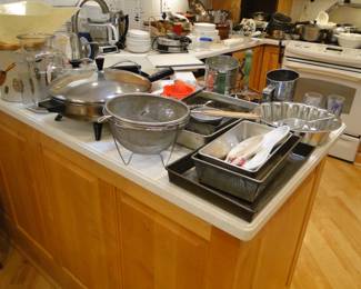Pots and pans to cook and bake with. One we have never seen before actually is a Crisco square bake tin