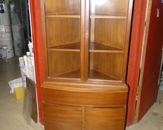 Hello B E A U T I F U L!!!! This Mid Century Modern, corner cabinet is simply the best