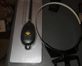Talking digital thermometer, and magnifying lens