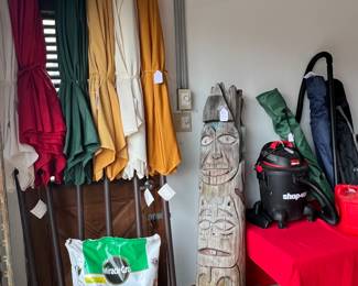 UMBRELLAS AND TOTEM POLE