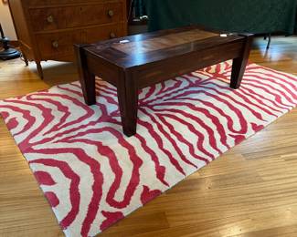 Rugs and copper inlay coffee table