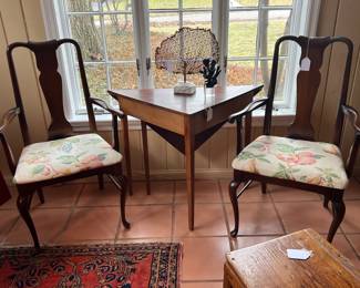 Two armchairs match the dining room side chairs.....This table is not for sale