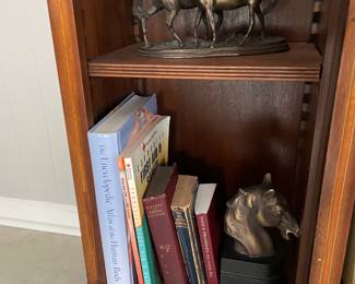 Brass bookends and statues 