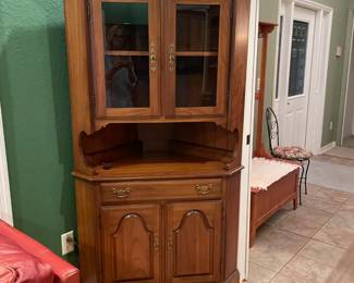 2 matching corner cabinets