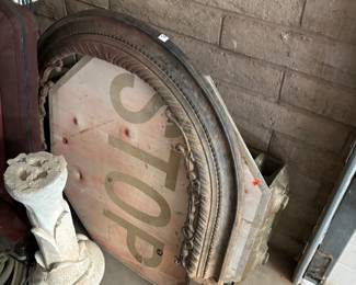 Antique Decorative Items
A mix of antique items, including a large ornate wooden frame, a vintage stop sign, and a classical white pedestal. Perfect for collectors or as unique statement pieces.