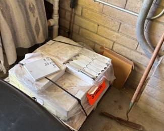 Pallet of Tiles and Miscellaneous Tools
A pallet of tiles in neutral tones, ideal for flooring or wall projects. Accompanied by various tools and supplies, making it a practical find for DIY projects.