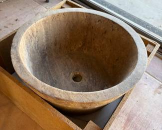 Earthy Stone Basin with a Rustic Finish
A deep, earthy-toned stone basin with natural textures, perfect as a unique sink or decorative piece for indoor or outdoor use.