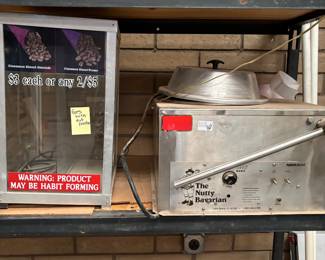 The Nutty Bavarian Roasting Machine with Display Case:
A commercial-grade Nutty Bavarian roasting machine with a display case for cinnamon-glazed nuts. Perfect for small business owners or nostalgic collectors.