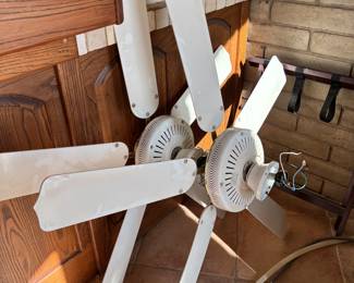 Ceiling Fan Components
White ceiling fan blades and motor parts, perfect for repairs or completing a DIY project. A practical option for home improvement enthusiasts.
